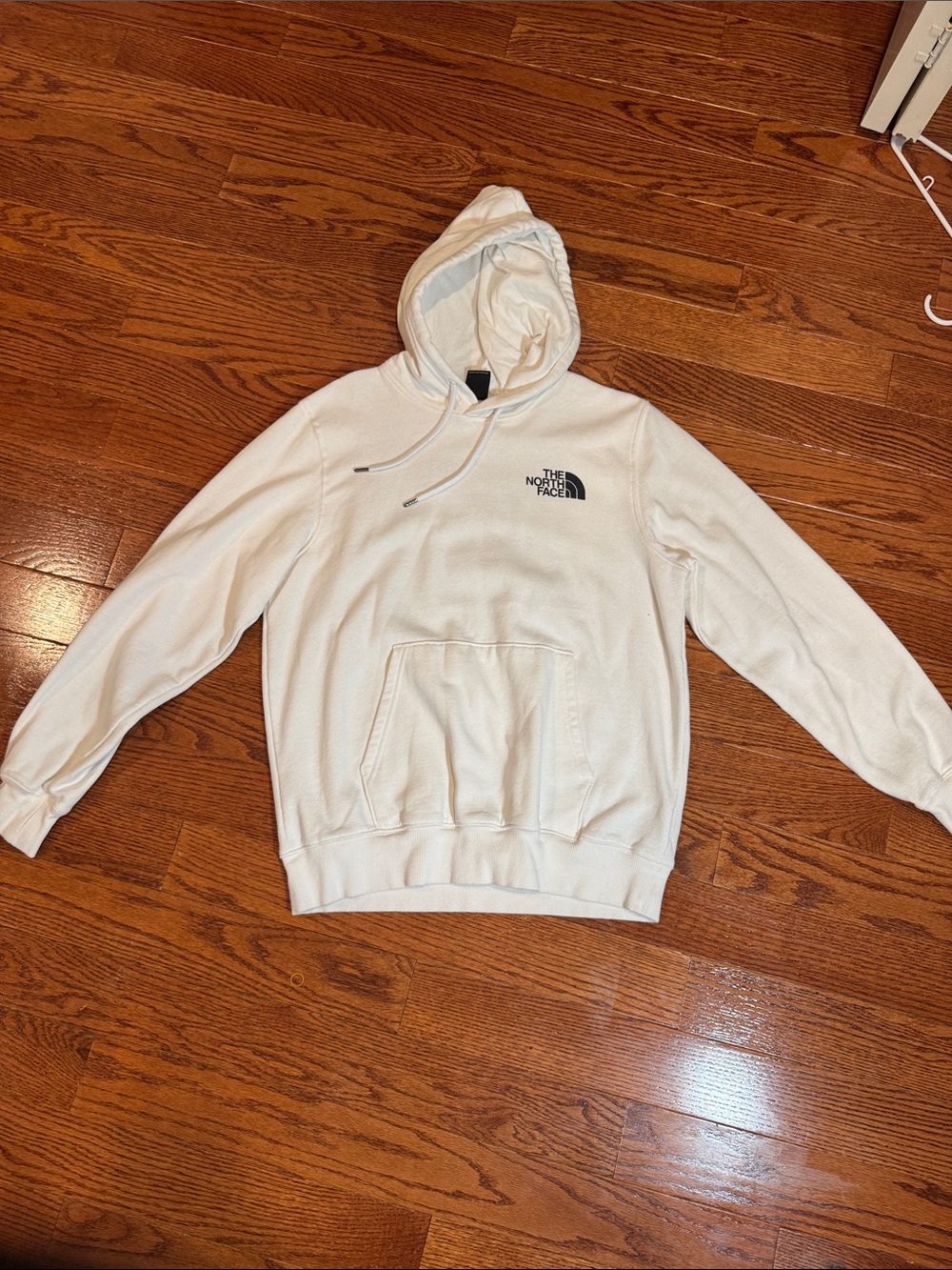 The North Face Cream Pullover Hoodie with Black Logo